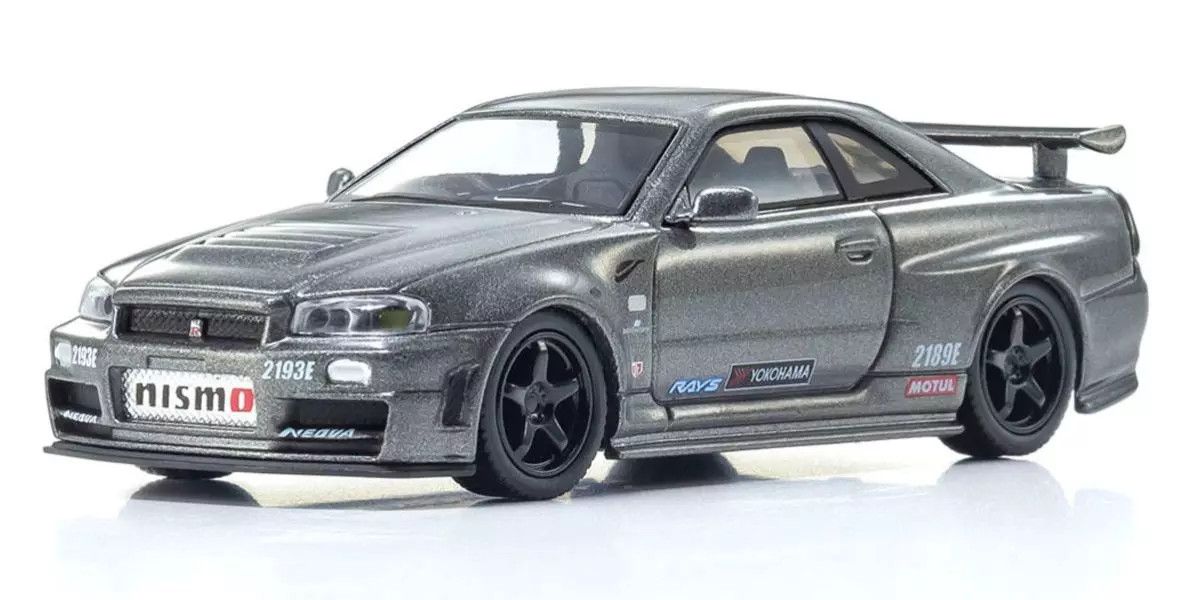 Kyosho - [MOTN] Nissan Skyline R34 GT-R NISMO CRS Ver. with LED (Gray), escala 1:64