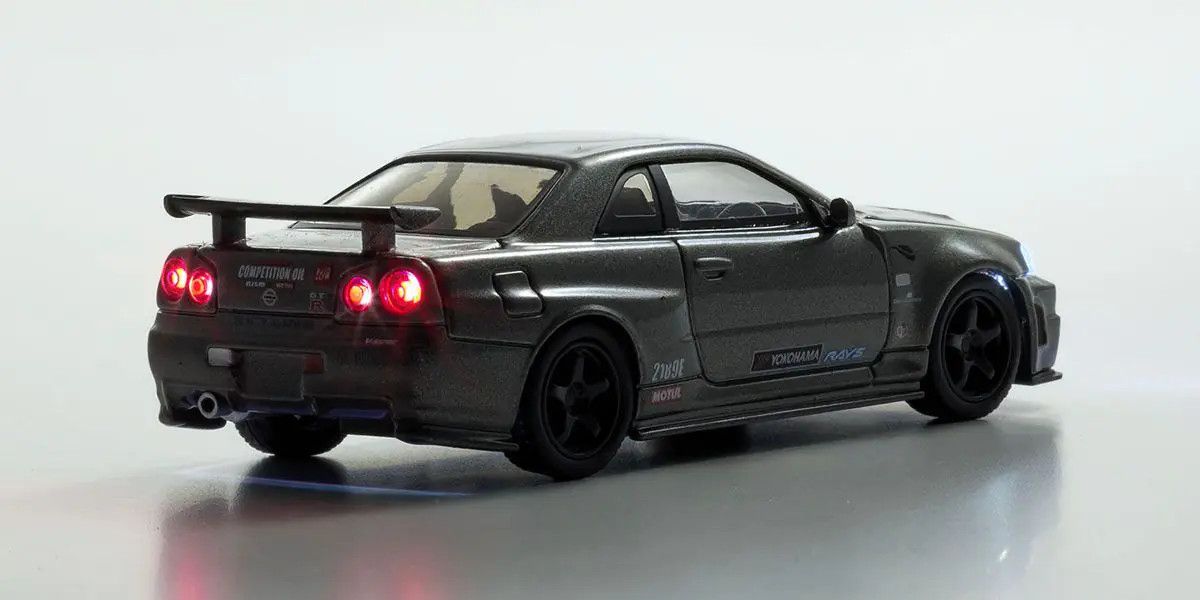 Kyosho - [MOTN] Nissan Skyline R34 GT-R NISMO CRS Ver. with LED (Gray), escala 1:64
